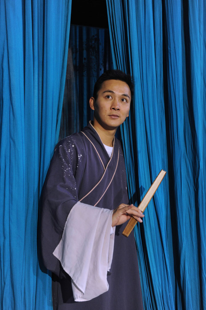 Zeng Jie practices his singing skills in Zhejiang Kunqu Troupe in Hangzhou, capital of east China's Zhejiang Province, Dec. 8, 2011. (Xinhua/Han Chuanhao)