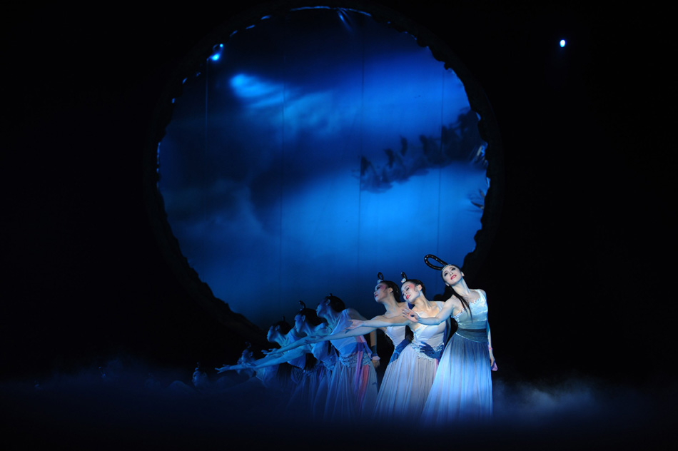 Dancers perform during the dance drama Goddess And The Dreamer in Zhengzhou, capital of central China's Henan Province, March 23, 2012. (Xinhua/Zhao Peng)