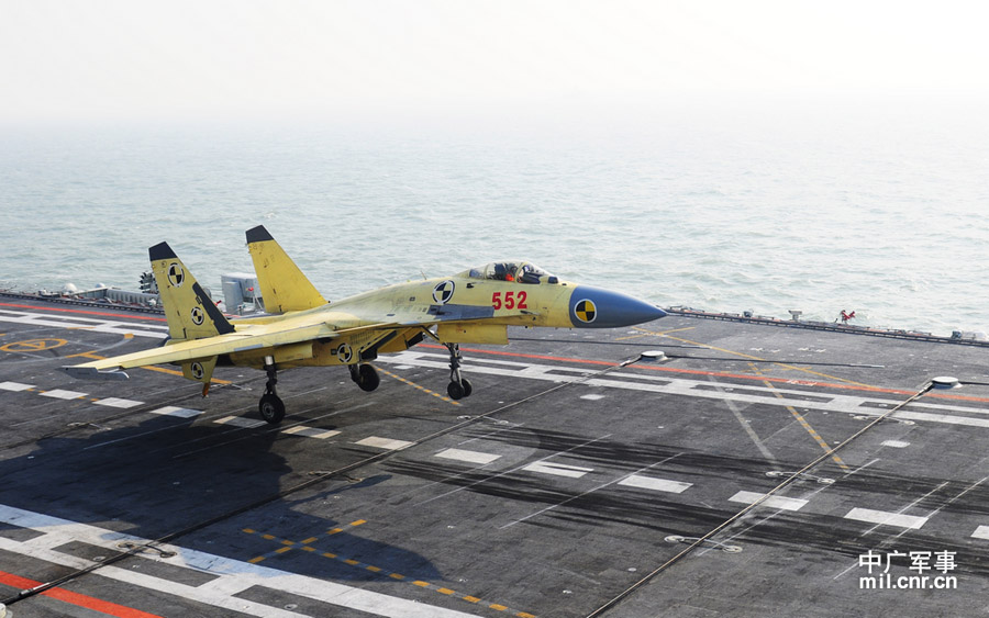 Photo shows carrier-borne J-15 fighter jet lands on China's first aircraft carrier, the Liaoning. (mil. cnr.cn/ Sun Li)