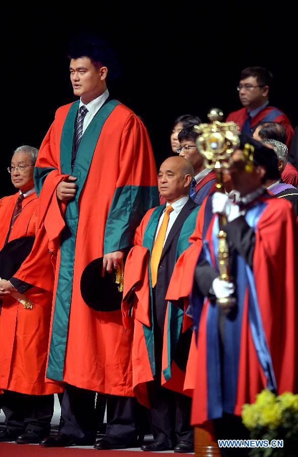 Former NBA star Yao Ming (2nd L) is seen during the 187th Congregation of the University of Hong Kong, China, on Nov. 27, 2012. Yao Ming receives a Doctor Degree of Social Sciences honoris causa at the University of Hong Kong on Tuesday. (Xinhua/Chen Xiaowei) 