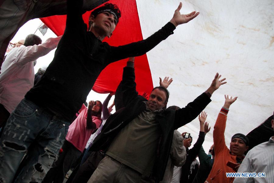 Anti-Mursi protesters gather at Tahrir Square in Cairo, to participate a one-million-person rally rejecting the new constitutional declaration issued by President Mohamed Morsi on Nov. 27, 2012. (Xinhua/Amru Salahuddien) 