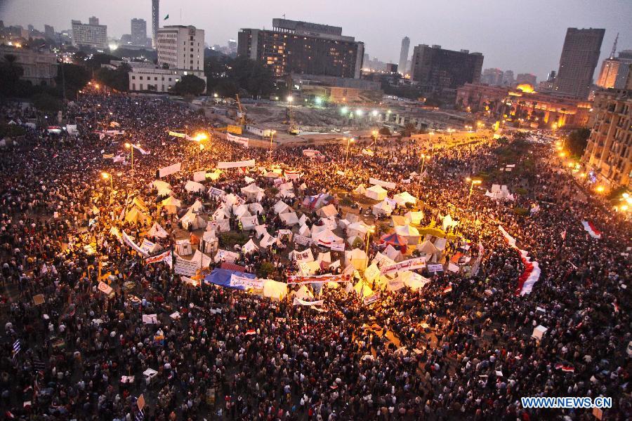 Anti-Mursi protesters gather at Tahrir Square in Cairo, to participate a one-million-person rally rejecting the new constitutional declaration issued by President Mohamed Morsi on Nov. 27, 2012. (Xinhua/Amru Salahuddien)