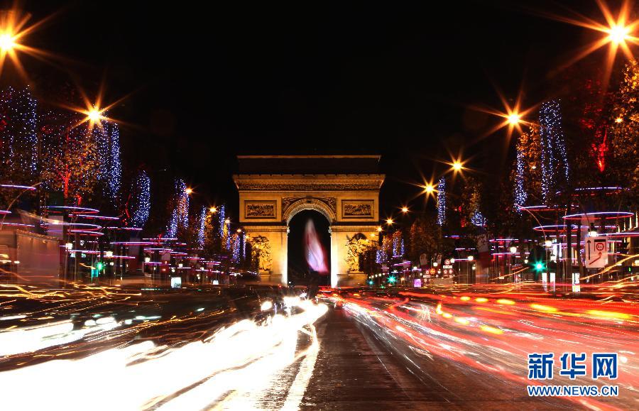 The Champs Elysees is decorated by illuminations in Paris, capital of France, on Nov. 21, 2012, which marks opening of Christmas Season in Paris. (Xinhua/Gao Jing)