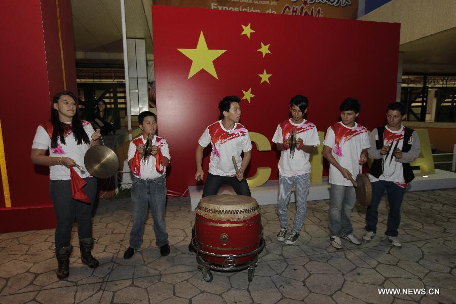 Artists perform during the opening of the Second Chinese Trade Exhibition at the International Center for Fairs and Conventions, in San Salvador, capital of El Salvador, on Nov. 28, 2012. China organized for the second time a trade fair, in which 40 companies showed different products in three days. (Xinhua/Oscar Rivera)