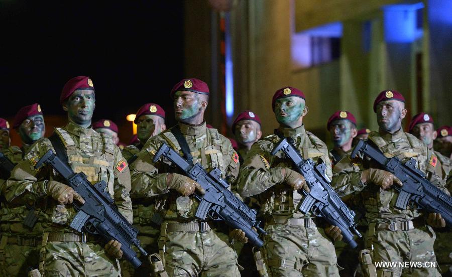 Albanian soldiers take part in the celebration marking the country's 100th anniversary of independence, in Tirana, Albania, Nov. 28, 2012. (Xinhua/Gent Dodoveci) 