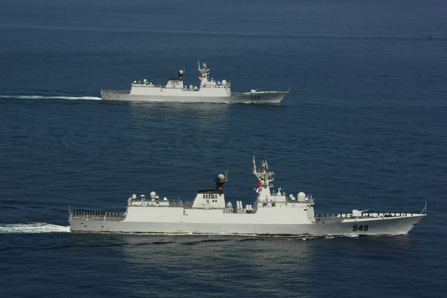 The 12th and the 13th Chinese naval escort taskforces under the Navy of the Chinese People's Liberation Army (PLA) held a separation ceremony in the western waters of the Gulf of Aden on November 27, 2012 after they have successfully completed their two joint escort missions. (Xinhua/Zhu Shaobin)