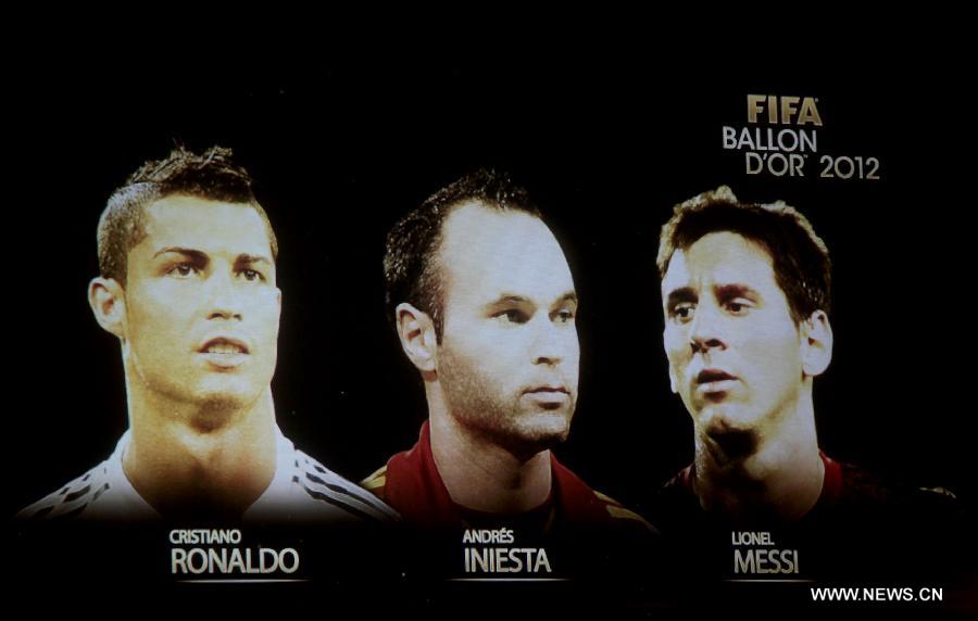 A photo of the three finalists is shown on the screen during the announcement of the finalists of Golden Ball award in Sao Paulo, Brazil, Nov. 29, 2012. (Xinhua/Agencia Estado) 