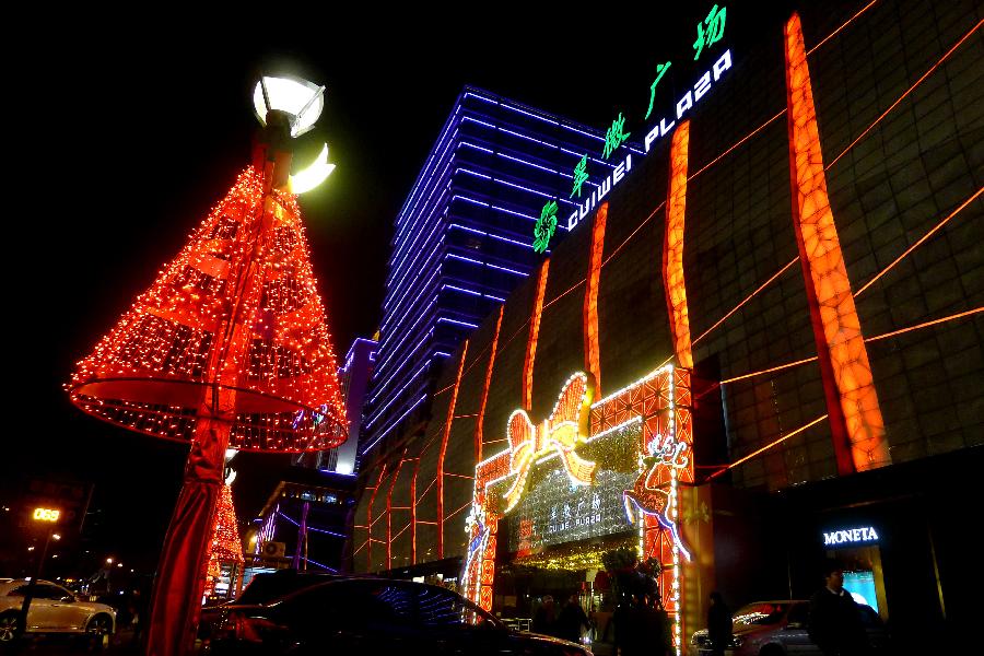 Christmas decorations are seen in downtown Beijing, capital of China, Nov. 29, 2012. (Xinhua/Li Wenming) 