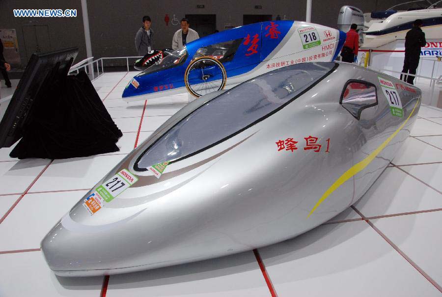 A eco-car designed by Japanese automaker Honda is shown at the 10th China (Guangzhou) International Automobile Exhibition in Guangzhou, capital of south China's Guangdong Province, Dec. 2, 2012. The ten-day auto show, which kicked off on Nov. 23, 2012, closed on Sunday. (Xinhua/Yuan Hongwei)