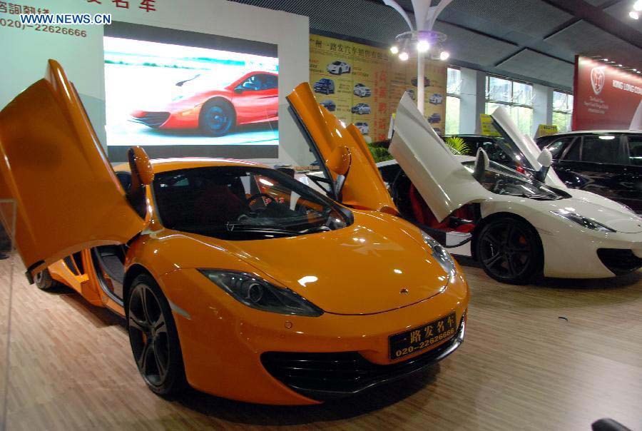Photo taken on Dec. 2, 2012 shows sports cars displayed at the 10th China (Guangzhou) International Automobile Exhibition in Guangzhou, capital of south China's Guangdong Province. The ten-day auto show, which kicked off on Nov. 23, 2012, closed on Sunday. (Xinhua/Yuan Hongwei)
