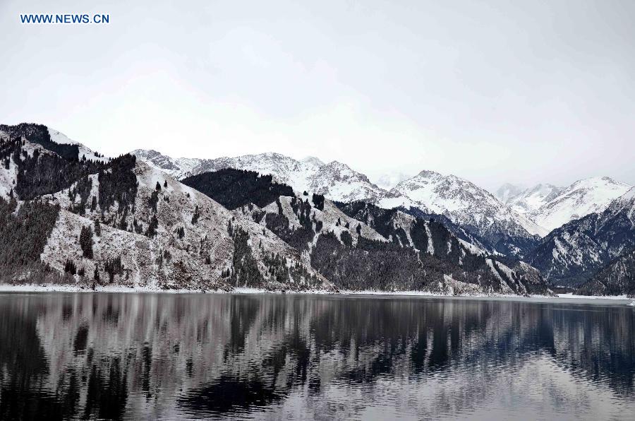 Photo taken on Dec. 1, 2012 shows the scenery of the Tianchi Scenic Zone in the Tianshan Mountains, northwest China's Xinjiang Uygur Autonomous Region. The Tianchi Ice and Snow Festival kicked off at the scenic spot on Saturday. (Xinhua/Yu Tao)