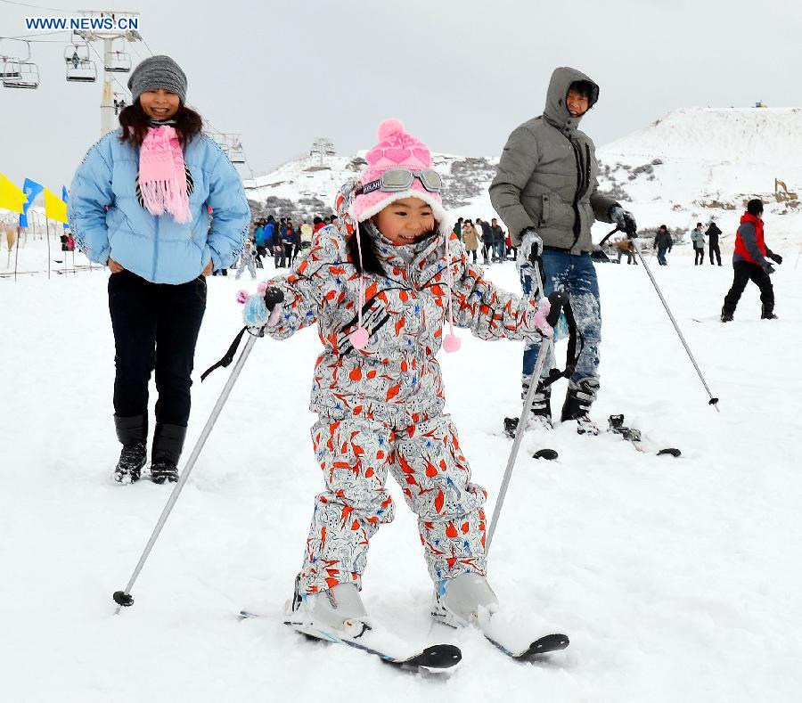 Tourists ski at the Tianchi Scenic Zone in the Tianshan Mountains, northwest China's Xinjiang Uygur Autonomous Region, Dec. 1, 2012. The Tianchi Ice and Snow Festival kicked off at the scenic spot on Saturday. (Xinhua/Yu Tao) 