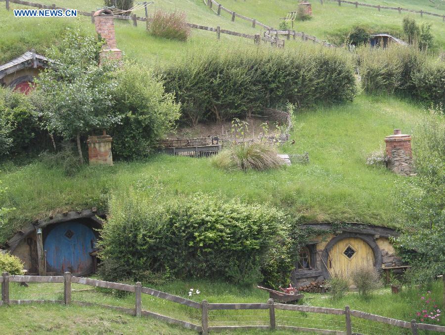 Photo taken on Nov. 29, 2012 shows the Hobbit movie's filming location at Hobbiton on the Alexander family farm near New Zealand's north island town of Matamata. The film set of "The Hobbit: An Unexpected Journey" is such fantastic in the rolling countryside that closely resembled the "Shire" in the popular classics by J.R.R Tolkien, attracting a lot of fans and tourists. (Xinhua/Liu Jieqiu)