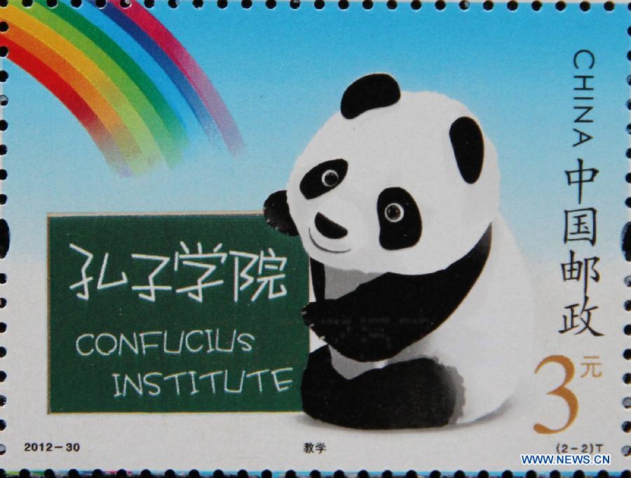 Photo taken on Dec. 1, 2012 shows the newly issued special stamps of Confucius Institute in Handan City, north China's Hebei Province. China Post Group issued nationwide a set of special stamps of Confucius Institute themed "interaction"and "teaching" on Saturday. (Xinhua/Wang Jiuzhong)
