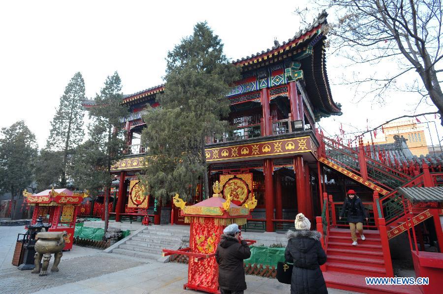 Tourists visit the Tianhou Temple in north China's Tianjin Municipality, Dec. 3, 2012. The Tianhou Temple completed its repair work and was opened to society on Monday. (Xinhua/Wang Xiaoming) 