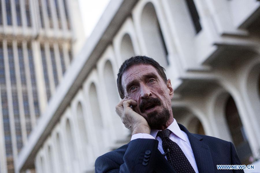 US anti-virus software pioneer John McAfee arrives to a news conference in front of the Supreme Court in Guatemala City, capital of Guatemala, on Dec. 4, 2012. McAfee, wanted for questioning over the murder of his neighbor last month in Belize, is seeking political asylum in Guatemala, according to local media. (Xinhua/Luis Echeverria) 
