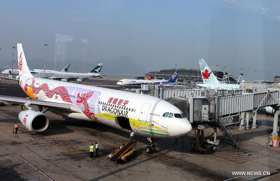 A plane parks at Hong Kong International Airport in Hong Kong, South China, Nov. 14, 2012. Hong Kong ranks first in the ranking list of China city comprehensive competitiveness released by China Institute of City Competitiveness(CICC) on Wednesday. (Xinhua/Li Peng)