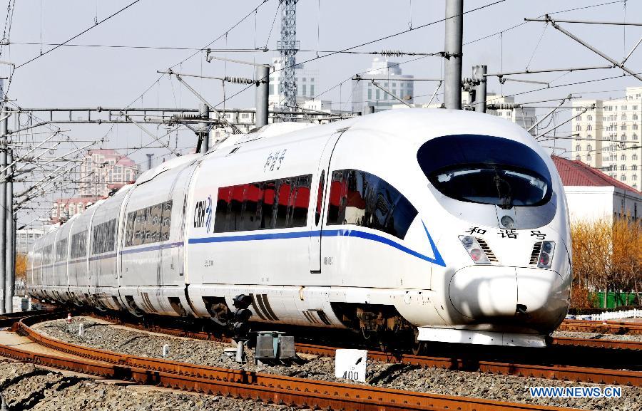 A high-speed train departs from Tianjin Railway Station in Tianjin, north China, Dec. 5, 2012. China's electric railway mileage has surpassed 48,000 kilometers, ranking first in the world, the China Railway Engineering Corporation Railway Electrification Bureau Group Co., Ltd. (EEB) said on Dec. 4, 2012. Wang Zuoxiang, head of the EEB technology department, said the country started to build electric railways in 1958, and in just over half a century, the mileage has exceeded that of Russia, the former country with the most electric railway mileage. (Xinhua/Yang Baosen) 