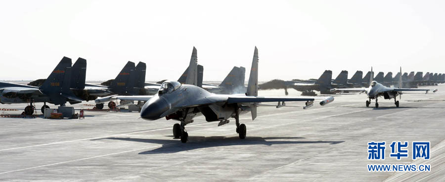 More than 100 top pilots from 14 aviation brigades and regiments of the Air Force of the Chinese People's Liberation Army (PLA) pilot their fighters to conduct an air combat confrontation training at an experimental training base of the PLA Air Force in northwest China. (Xinhua/Yu Hongchun)