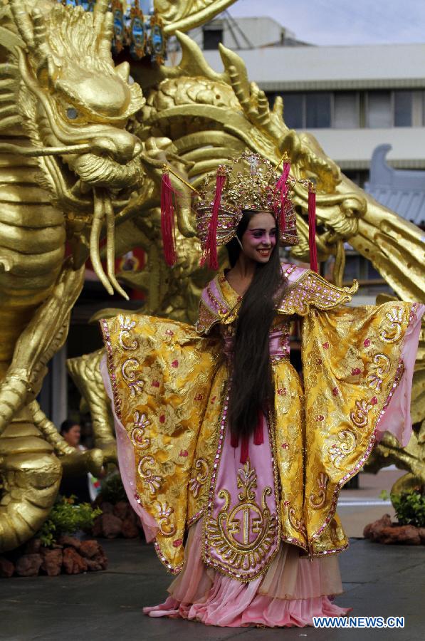 An actress performs at the opening of the new Chinatown in San Jose, capital of Costa Rica, on Dec. 5, 2012. (Xinhua/Kent Gilbert) 