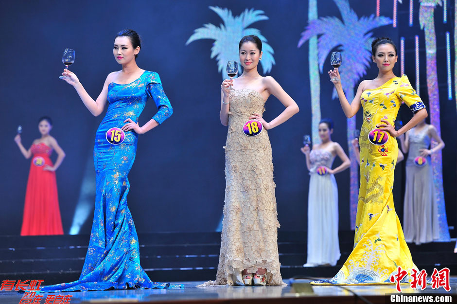 Contestants perform at the China Final of the 9th Miss Tourism Cultural World held in south China's Hainan Province on Dec. 5, 2012.(CNSPHOTO/Luo Yunfei)