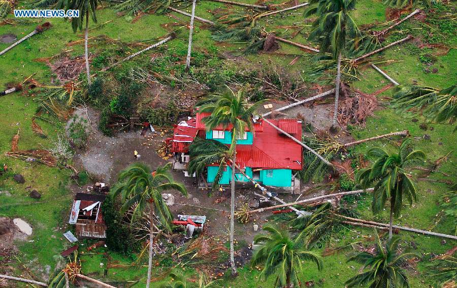 Photo taken on Dec. 7, 2012 shows the typhoon-affected area in southern province of Compostela Valley, the Philippines. The death toll of Typhoon Bopha, locally known as Pablo, has climbed to 456 as more bodies were dug out from disaster-affected areas in southern Philippines, the National Disaster Risk Reduction and Management Council (NDRRMC) announced on Friday. (Xinhua/Jay Morales) 