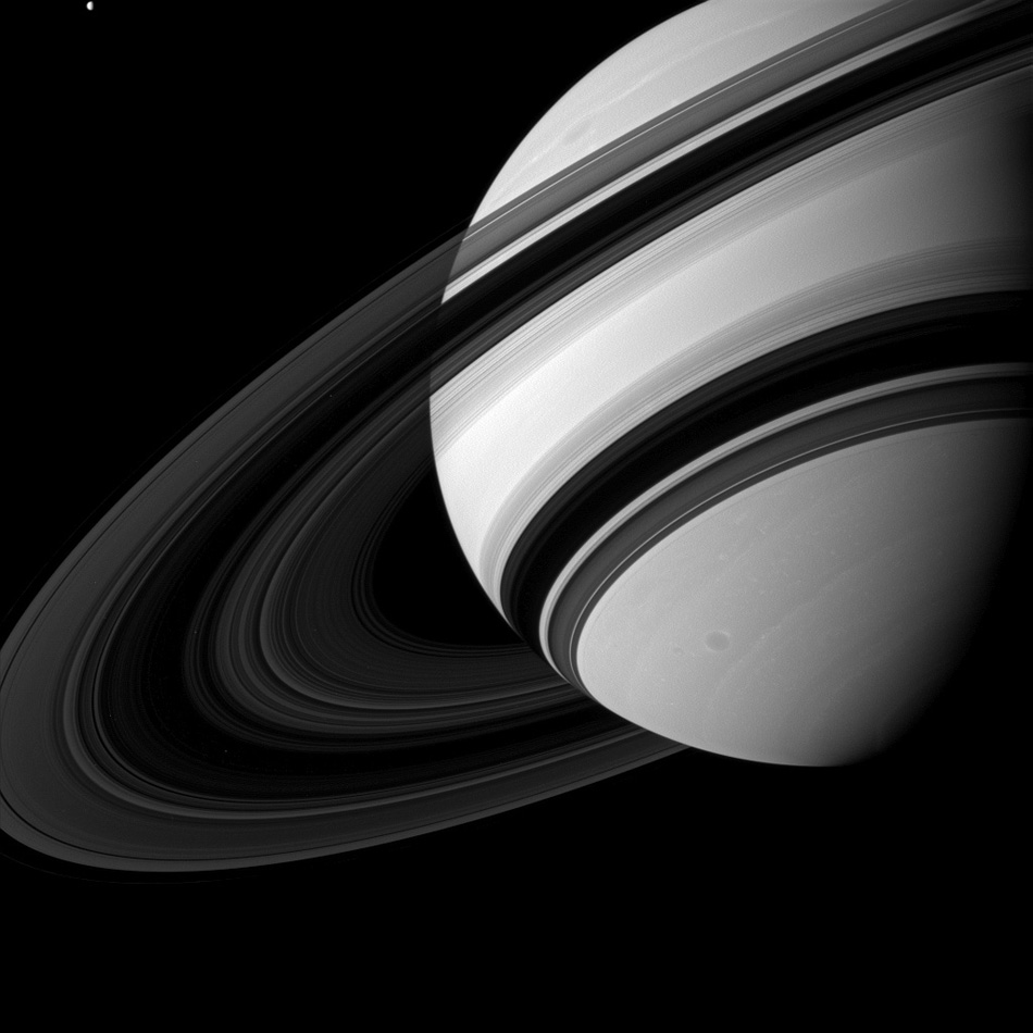 Tiny Tethys. Tethys may not be tiny by normal standards, but when it is captured alongside Saturn, it can't help but seem pretty small. (Photo/ NASA)