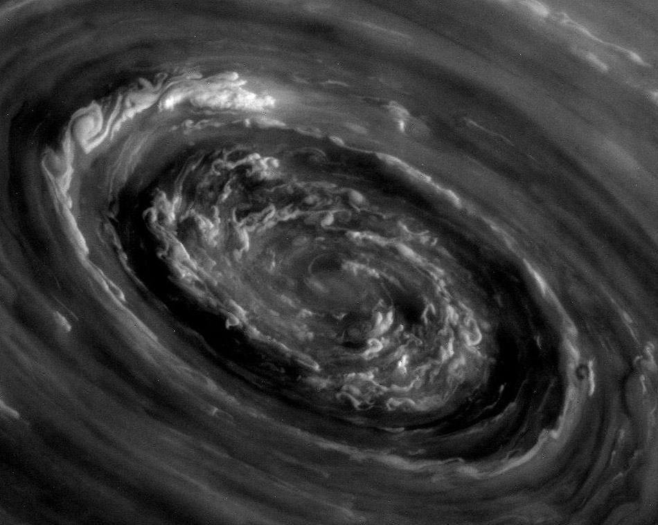 In the Center of Saturn's North Polar Vortex. What's happening at the north pole of Saturn? A vortex of strange and complex swirling clouds. The center of this vortex was imaged in unprecedented detail last week by the robotic Cassini spacecraft orbiting Saturn. (Photo/ NASA)