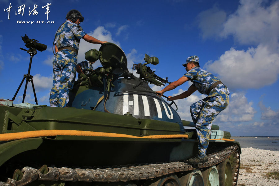 A tank company under a maritime garrison command of the Chinese People's Liberation Army (PLA) stationed on the Sansha Island conducts a live-ammunition shooting training with tank-mounted anti-aircraft machine gun, in a bid to temper troops' combat capability. (navy.81.cn/Chen Xianling, Liu Weiping)