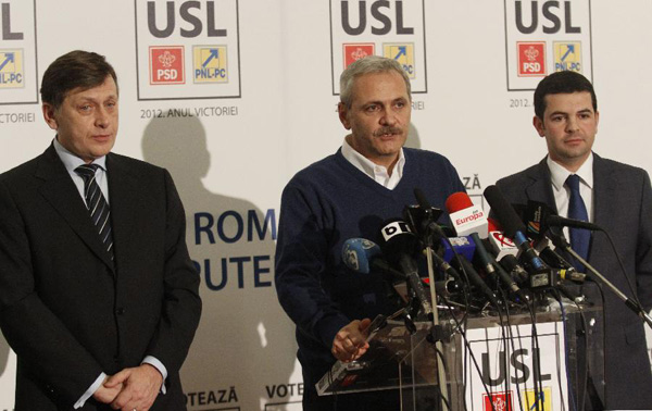 Liviu Dragnea (C), general secretary of Social Democrat Party, speaks during a press conference in Bucharest, capital of Romania, Dec 9, 2012. The ruling Social Liberal Union is poised to have won an overwhelming victory in Romania's quadrennial parliamentary elections, as some 57 percent of the over 18 million voters supposed to cast their ballots for the ruling coalition, according to the exit polls results released soon after voting. (Xinhua/Gabriel Petrescu)