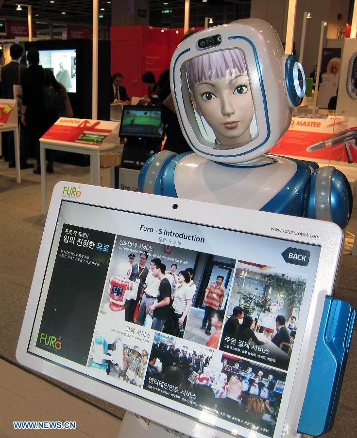 A restaurant server robot is seen on display at the 8th Inno Design Tech Expo in south China's Hong Kong, Dec. 7, 2012. The three-day exposition kicked off Thursday at Hong Kong Convention and Exhibition Center, with more than 350 exhibitors from 11 countries and regions. (Xinhua/Zhao Yusi) 