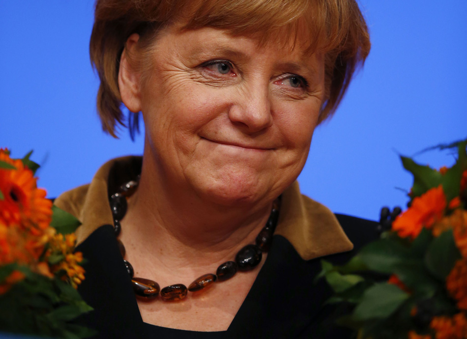 German Chancellor Angela Merkel is re-elected as leader of the Christian Democratic Union party with 98 percent of the votes, the highest voting rate since 2000. (Xinhua/Reuters)  