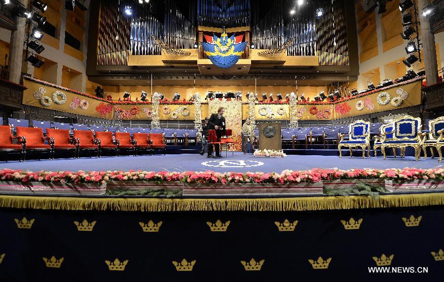 Staff make final preparations for 2012 Nobel award ceremony at Concert Hall in Stockholm, capital of Sweden on Dec. 10, 2012. (Xinhua/Wu Wei) 