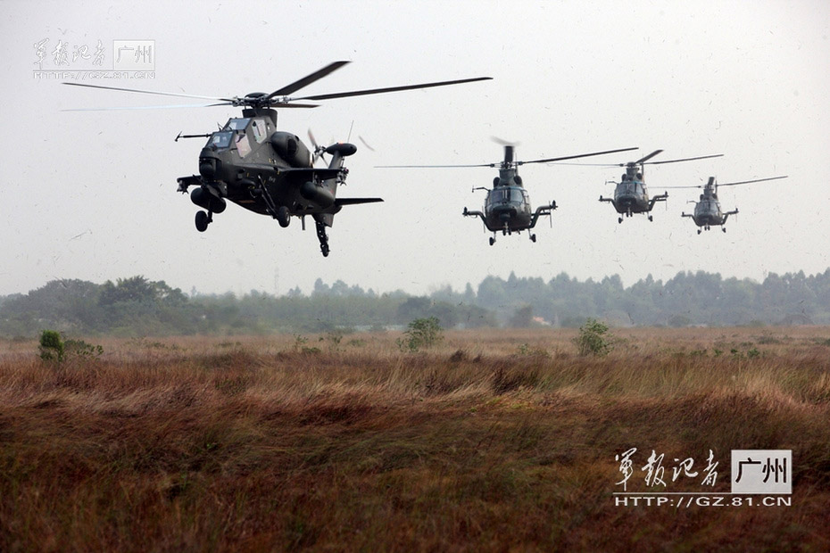 China's independently-developed WZ-10 armed helicopters of an army aviation brigade of the Guangzhou Military Area Command (MAC) of the Chinese People's Liberation Army (PLA) are in training. (China Military Online/Li Sanhong)