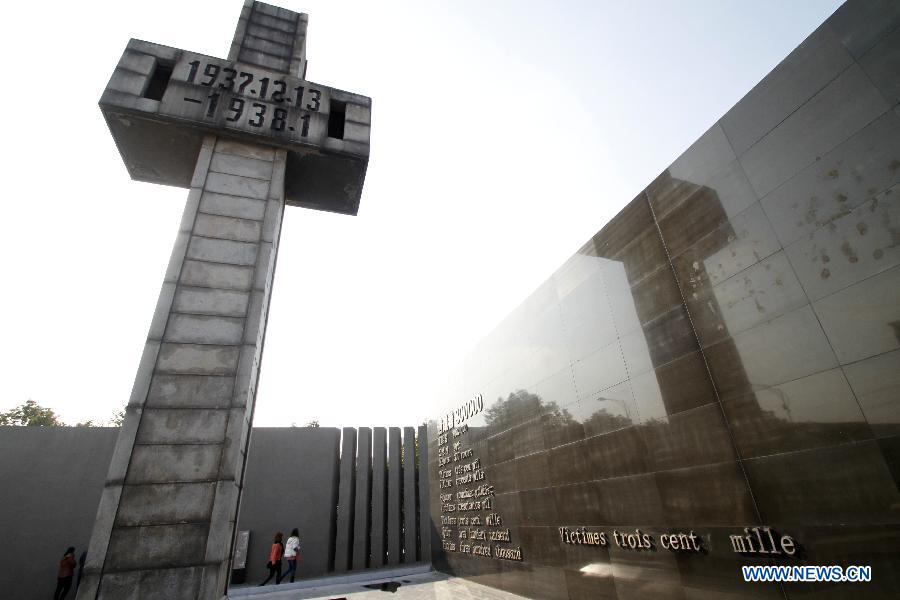 People visit the Memorial Hall of the Victims in Nanjing Massacre by Japanese Invaders during the World War II in Nanjing, capital of east China's Jiangsu Province, Dec. 11, 2012. A series of memorial activities will be held to commemorate the 75th anniversary of the Nanjing Massacre that left some 300,000 Chinese dead when the Japanese occupied Nanjing on Dec. 13, 1937 and began a six-week massacre. (Xinhua/Dong Jinlin)