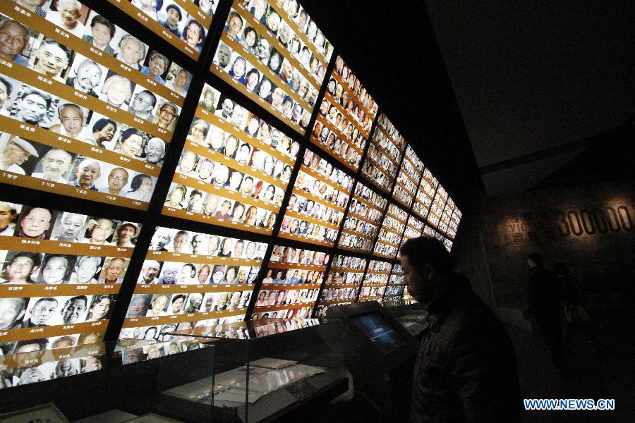 People visit the Memorial Hall of the Victims in Nanjing Massacre by Japanese Invaders during the World War II in Nanjing, capital of east China's Jiangsu Province, Dec. 11, 2012. A series of memorial activities will be held to commemorate the 75th anniversary of the Nanjing Massacre that left some 300,000 Chinese dead when the Japanese occupied Nanjing on Dec. 13, 1937 and began a six-week massacre. (Xinhua/Dong Jinlin) 