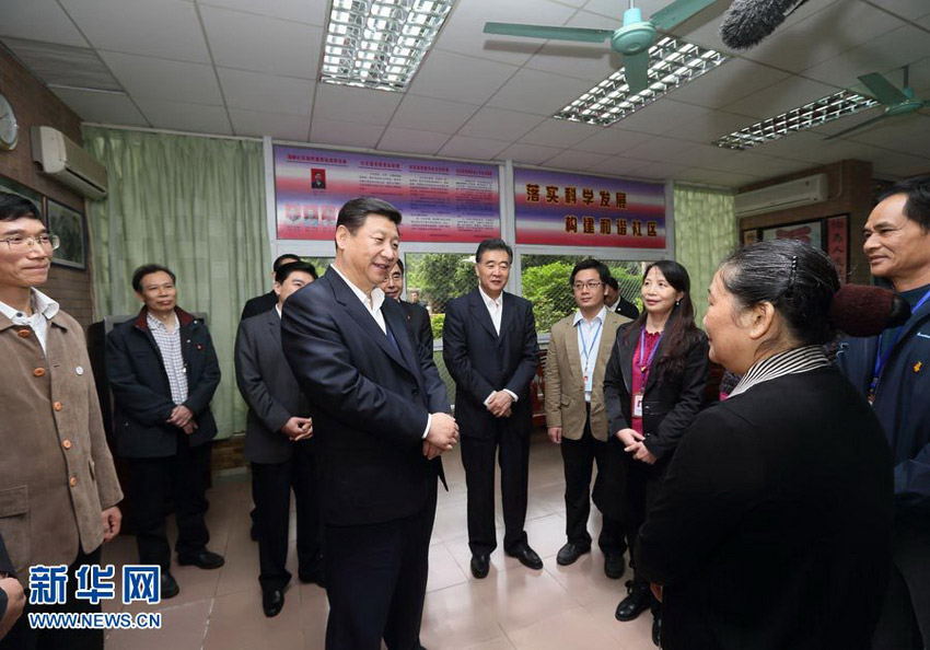 Photo released on Dec. 11, 2012 shows Xi Jinping, general secretary of the Communist Party of China (CPC) Central Committee and chairman of the CPC Central Military Commission (CMC), visits the residents' committee of a community in Shenzhen, south China's Guangdong Province. Xi made an inspection tour in Guangdong from Dec. 7 to Dec. 11. (Xinhua/Lan Hongguang)
