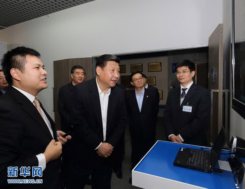 Photo released on Dec. 11, 2012 shows Xi Jinping, general secretary of the Communist Party of China (CPC) Central Committee and chairman of the CPC Central Military Commission (CMC), inspects Kuang-chi Institute of Advanced Technology in Shenzhen, south China's Guangdong Province. Xi made an inspection tour in Guangdong from Dec. 7 to Dec. 11. (Xinhua/Lan Hongguang)
