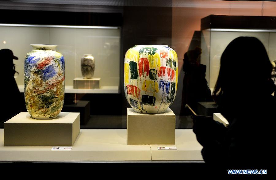 Photo taken on Dec. 12, 2012 shows porcelain artworks created by Chinese artist Pan Lusheng at Pan's solo art exhibition in Shandong Museum in Jinan, capital of east China's Shandong Province. Nearly 100 pieces of porcelain artworks by Pan were displayed at the exhibition which kicked off on Wednesday. (Xinhua/Zhu Zheng)