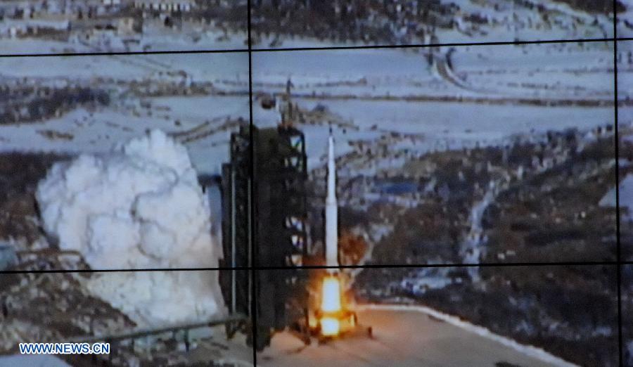 Photo released by the official KCNA news agency of the Democratic People's Republic of Korea (DPRK) on Dec. 12, 2012 shows the Unha-3 carrier rocket launching with the satellite Kwangmyongsong-3, on a monitor screen at the satellite control center. According to the KCNA, the second version of Kwangmyongsong-3 was launched by an Unha-3 carrier rocket at 9:49 a.m. local time (0049 GMT) Wednesday from the Sohae Space Center in Cholsan County, North Phyongan Province, and entered the preset orbit. (Xinhua/KCNA)