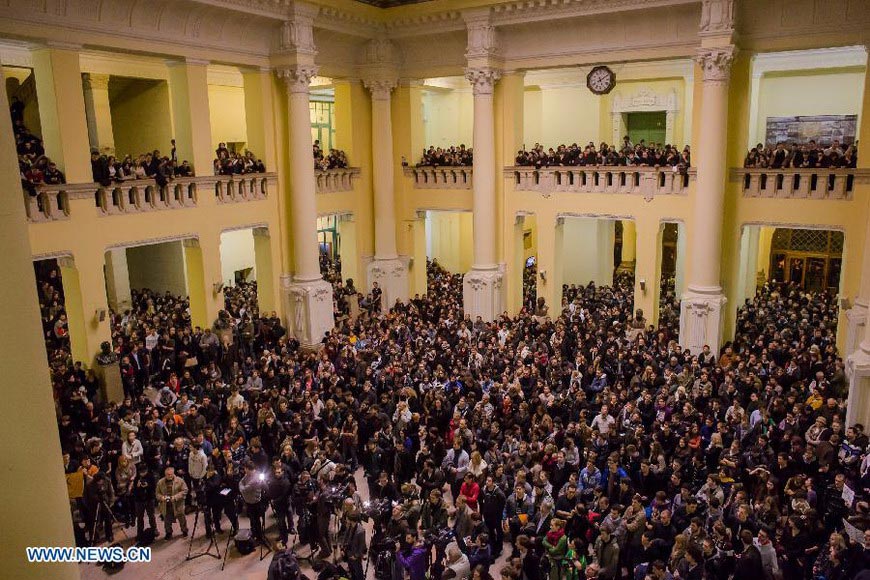 Students gather in a hall of the Technology University before their protest against the planned reforms of Hungarian education system in Budapest, capital of Hungary, on Dec. 12, 2012. (Xinhua/Attila Volgyi)