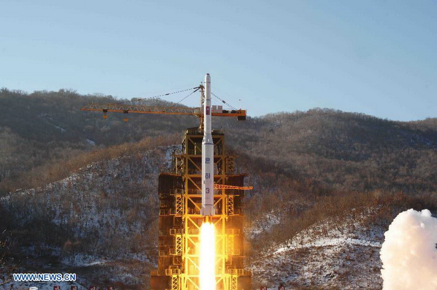 This photo provided by KCNA on Dec. 14, 2012 shows the launch of Kwangmyongsong-3 satellite at the Pyongyang General Satellite Control Command Center on Dec. 12, 2012.  (Xinhua/KCNA) 