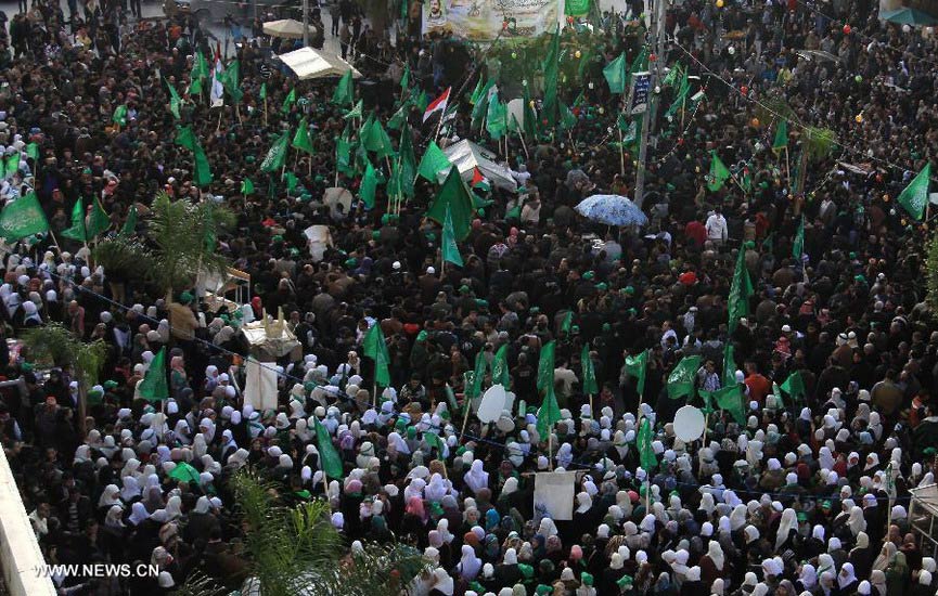 Thousands of Palestinian Hamas supporters take part in a rally marking the 25th anniversary of the Islamic movement, in the West Bank city of Nablus on Dec. 13, 2012. (Xinhua/Ayman Nobani) 