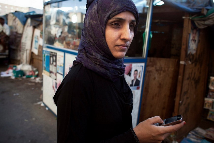 Yasmin al Qadi, 27, a feminist activist, first to appeal sexual equality in the early stage of anti-government activity. She says she is just fighting for the basic right as she receives the interview from a magazine. (Photo/ Global Times)