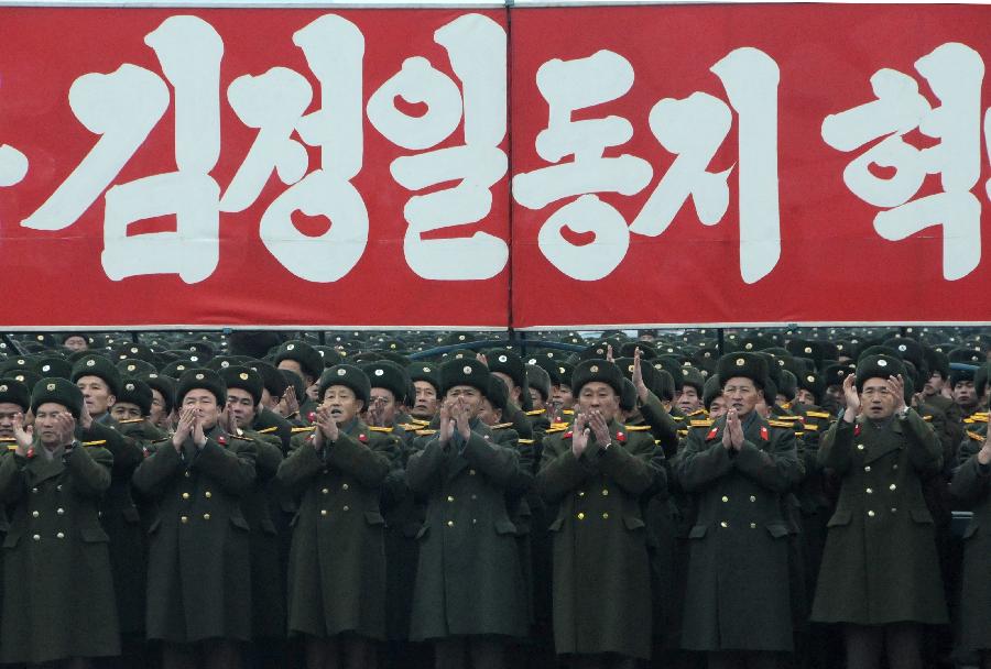 Military officers and soldiers attend a celebration for the successful launch of the Kwangmyongsong-3 satellite in Pyongyang, capital of the Democratic People's Republic of Korea (DPRK), on Dec. 14, 2012. According to the DPRK's official media KCNA, a Unha-3 rocket carrying the second version of the Kwangmyongsong-3 satellite blasted off from the Sohae Space Center in Cholsan County, North Phyongan Province, on Dec. 12. (Xinhua/Du Baiyu) 