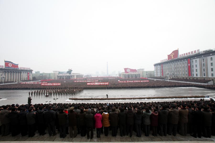 Military officers, soldiers and civilians gather to celebrate the successful launch of the Kwangmyongsong-3 satellite in Pyongyang, capital of the Democratic People's Republic of Korea (DPRK), on Dec. 14, 2012. According to the DPRK's official media KCNA, a Unha-3 rocket carrying the second version of the Kwangmyongsong-3 satellite blasted off from the Sohae Space Center in Cholsan County, North Phyongan Province, on Dec. 12. (Xinhua/Zeng Tao) 