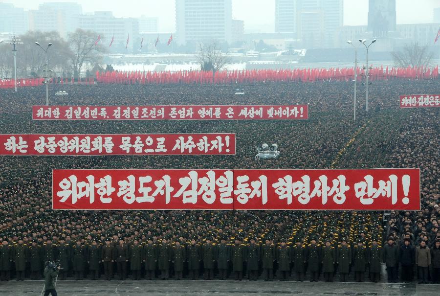 Military officers, soldiers and civilians gather to celebrate the successful launch of the Kwangmyongsong-3 satellite in Pyongyang, capital of the Democratic People's Republic of Korea (DPRK), on Dec. 14, 2012. According to the DPRK's official media KCNA, a Unha-3 rocket carrying the second version of the Kwangmyongsong-3 satellite blasted off from the Sohae Space Center in Cholsan County, North Phyongan Province, on Dec. 12. (Xinhua/Du Baiyu) 