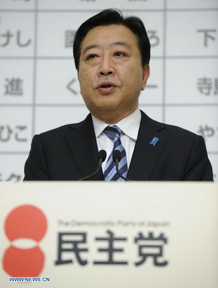 Japan's Prime Minister Yoshihiko Noda, leader of Japan's Democratical Party of Japan (DPJ), speaks during a news conference at his party's election headquarters in Tokyo, Dec. 16, 2012. Yoshihiko Noda, said on late Sunday that he quits from the party's presidency. (Xinhua/Kenichiro Seki)