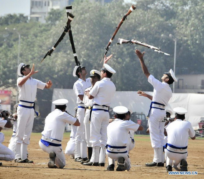Indian soldiers perform during a military drill and arms exhibition at Shivaji park in Mumbai, India, on Dec. 15, 2012. A troop of Indian Defense Ministry held the military drill and arms exhibition here to raise the public awareness of Indian army and military affairs on Saturday. (Xinhua/Wang Ping) 