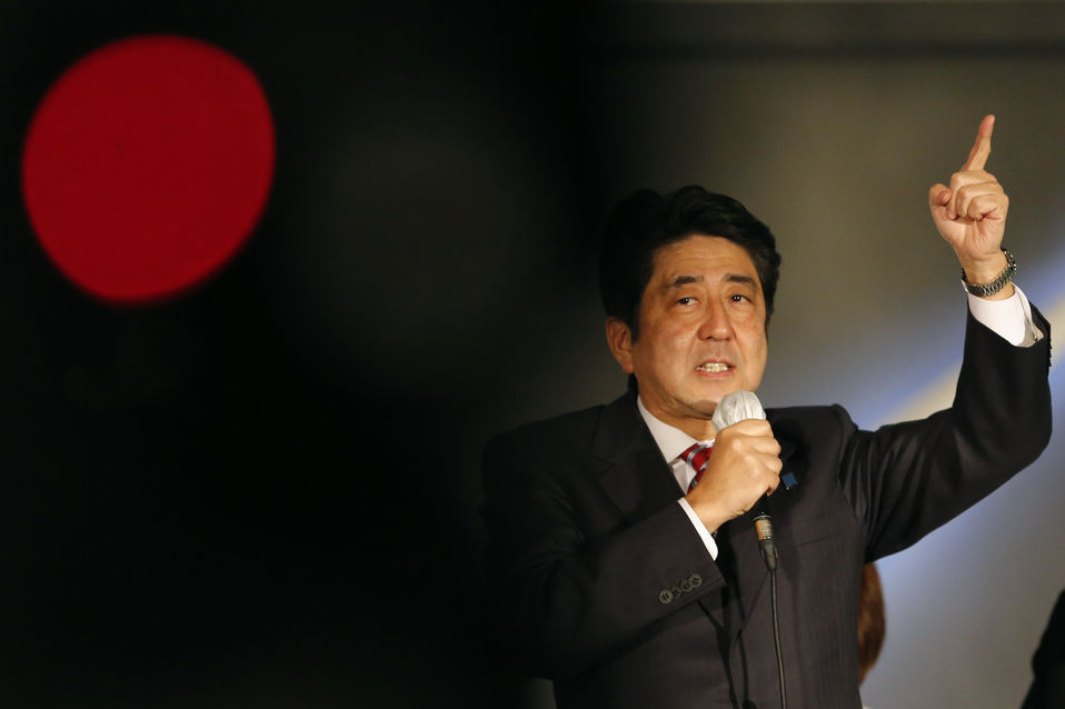 Japan's main opposition Liberal Democratic Party's (LDP) leader and former Prime Minister Shinzo Abe speaks to voters atop a campaign van at Akihabara electronics store district in Tokyo on December 15, 2012. (Xinhua/AFP)